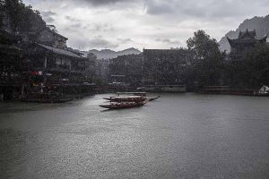 fenghuang china by rail stefano majno asia raining.jpg
